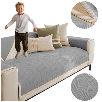 Matte, Sofaüberzug mit goldener Borte in der Farbe Dunelgrau, 90x210 cm.